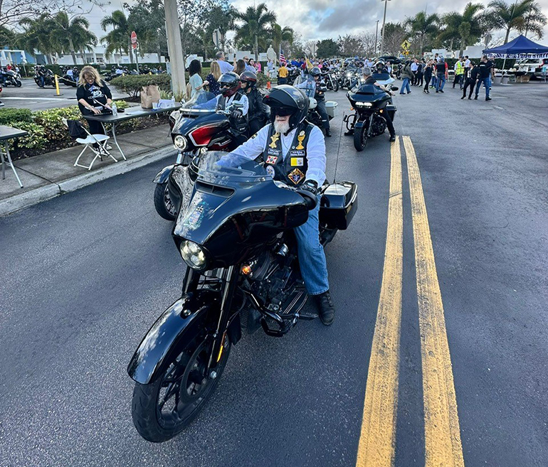 Archbishop Thomas Wenski takes the lead as 390 riders set off on the 12th annual Archbishop's Motorcycle Ride, held Jan. 28, 2024, starting from Our Lady of Guadalupe Church in Doral. The ride raised around $ 17,000 for St. Luke's Substance Abuse Treatment Center, a Catholic Charities facility in Miami.