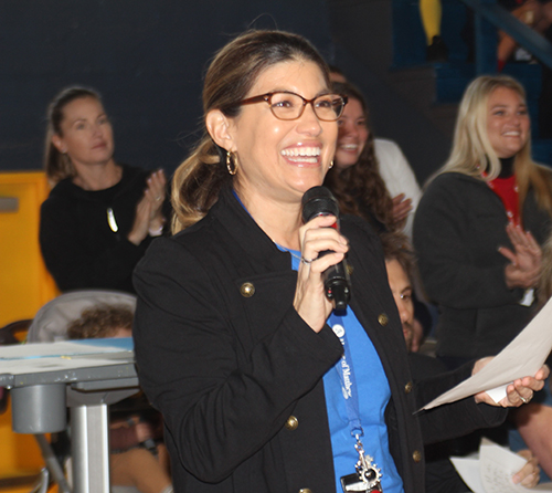 Gina Burpee, religious education coordinator at St. Anthony School, heads up the Bible Bowl Jan. 30, 2024, presenting questions to game players.
