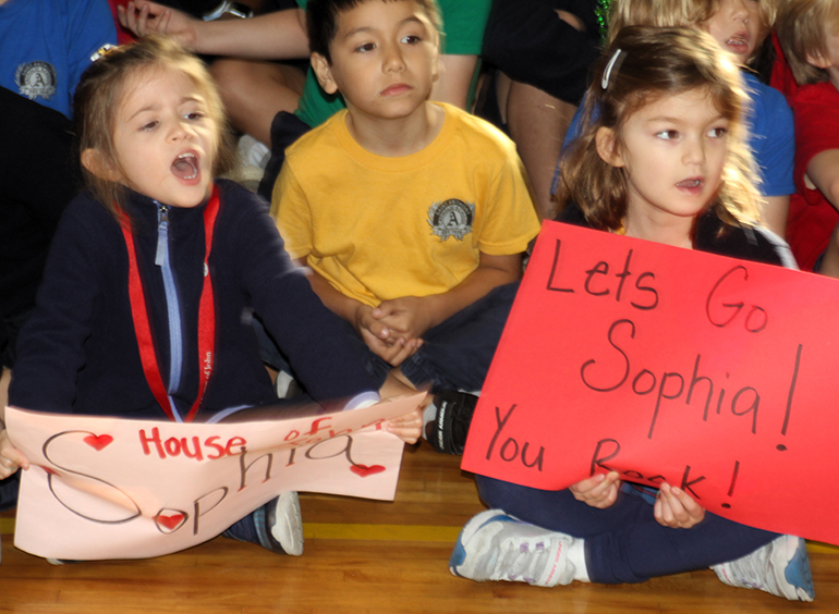 Fans cheer on their favorite team players during the Bible Bowl, held Jan. 30, 2024, at St. Anthony School in Fort Lauderdale.