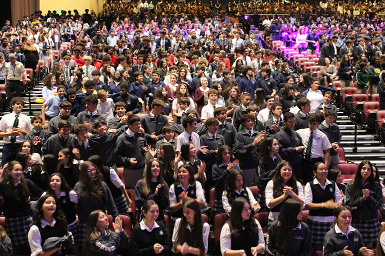 Nearly 2,000 eighth-grade students from archdiocesan schools stand and sing Happy Birthday to March celebrants during the Greater Love Conference on Mar. 6, 2024, in Pembroke Pines. At the event, they discussed topics such as Christian Anthropology, Theology of the Body, chastity, and more. The event was organized by the Office of Evangelization and Parish Life.