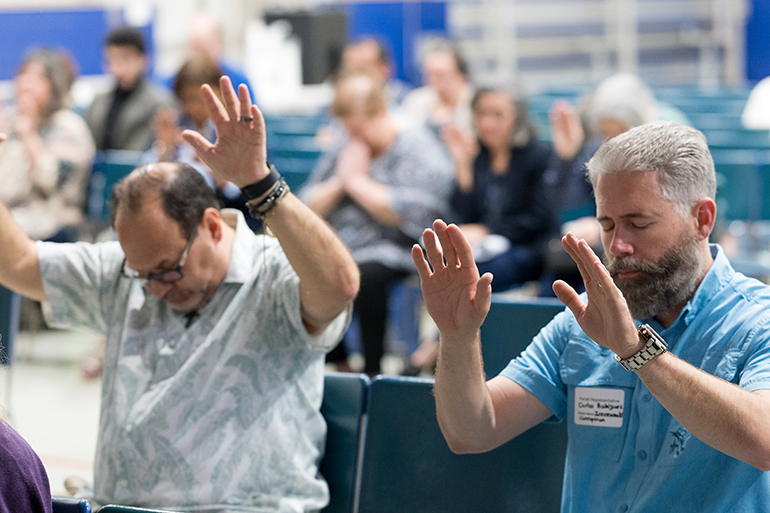 Parish representatives and others engage in prayer, conversation, and strategizing during a National Eucharistic Revival Summit, at St. Gregory the Great Church in Plantation, March 16, 2024.