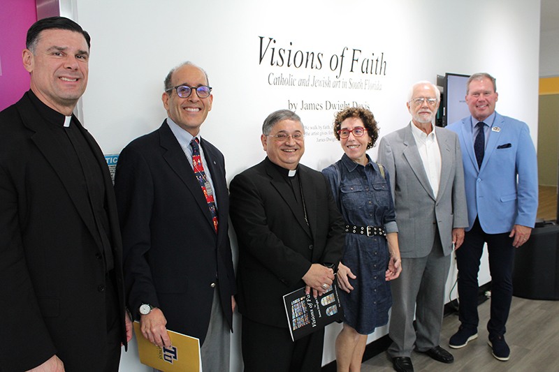 Various faculty and leadership representatives of St. Thomas University (STU) attended the opening of the 'Visions of Faith' interfaith sacred art exhibit unveiling at the Rev. Jorge A. Sardiñas Gallery on March 12, 2024. From left to right is Father Rafael Capo, vice president of mission at STU; Michael Winograd, assistant director for Miami Dade and Broward American Jewish Committee; Miami Auxiliary Bishop Enrique Delgado; Ellen Goldberg, photographer and Jewish communal professor; Jim Davis, photographer and writer; David Armstrong, president of STU.
