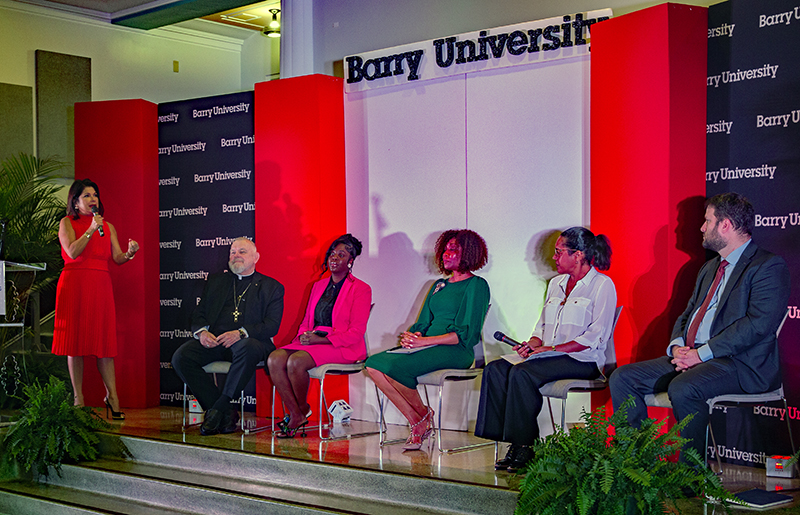 The Institute for Immigration Studies at Barry University sponsored an inaugural international immigration conference and arts festival at Barry University. From left: Jackie Nespral, panel moderator, NBC news-Miami; Archbishop Thomas Wenski, Michael's Saint-Vil, Miami Dade County Mayor's Office of the New American representative; Cassandra Suprin, Americans for Immigrant Justice; Tessa Petit, Florida Immigrant Coalition; and Joseph Kano, Catholic Legal Services.
