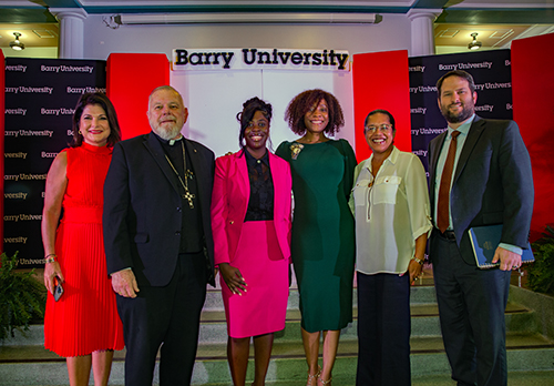 The Institute for Immigration Studies at Barry University sponsored an inaugural international immigration conference and arts festival at Barry University. From left: Jackie Nespral, panel moderator, NBC news-Miami; Archbishop Thomas Wenski, Michael's Saint-Vil, Miami Dade County Mayor's Office of the New American representative; Cassandra Suprin, Americans for Immigrant Justice; Tessa Petit, Florida Immigrant Coalition; and Joseph Kano, Catholic Legal Services.