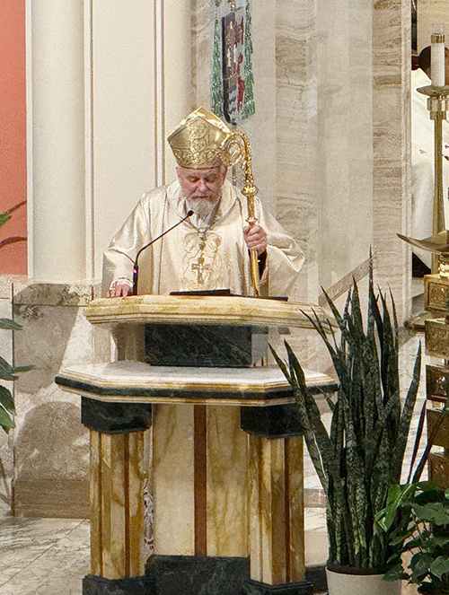 Archbishop Thomas Wenski preaches the homily during the Rite of Reception ceremony April 14, 2024, at St. Mary Cathedral.