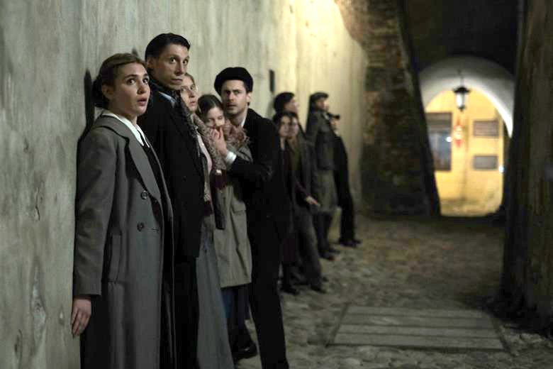 Sophie Nelisse stars as Irene Gut, left, alongside members of the ensemble cast in a scene from the movie "Irena's Vow." The OSV News classification is A-III -- adults. The Motion Picture Association of America rating is R -- restricted. Under 17 requires accompanying parent or adult guardian. (OSV news photo/Quiver)