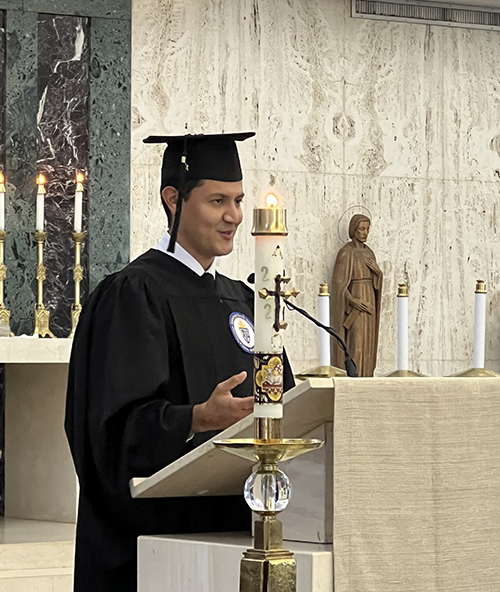 Class valedictorian and seminarian Alejandro Molina of the Archdiocese of Miami speaks during the Commencement Ceremony May 8, 2024, at St. John Vianney College Seminary. Molina, who received a Bachelor of Arts in Philosophy, was one of 12 graduates who received their degrees at the Commencement Ceremony following the Baccalaureate Mass.