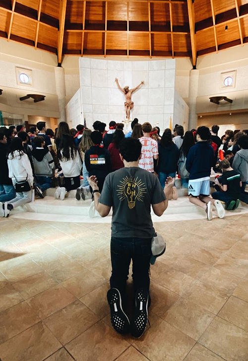 Members of the youth group from St. Mark Parish in Southwest Ranches participate in Eucharistic Adoration in preparation for the National Eucharistic Congress to be held July 17-21 in Indianapolis, Indiana.