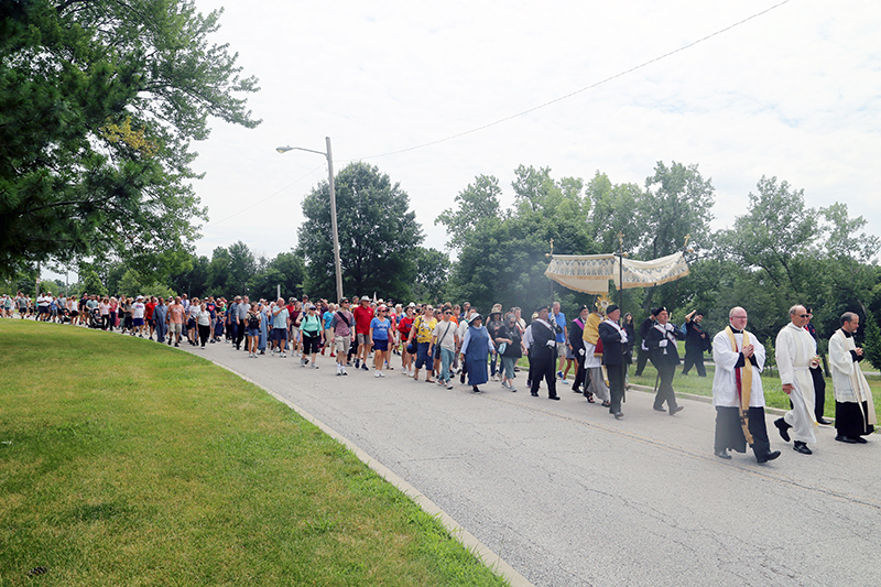 The St. Junipero Serra Route of the National Eucharistic Pilgrimage enters Rosedale Park in Kansas City, Kansas, in the Archdiocese of Kansas City June 28, 2024. The St. Junipero Serra is one of four routes of the eight-week National Eucharistic Pilgrimage. Pilgrims departed with the Eucharist on Pentecost weekend from points in California, Connecticut, Minnesota and Texas to meet in Indianapolis for the congress.