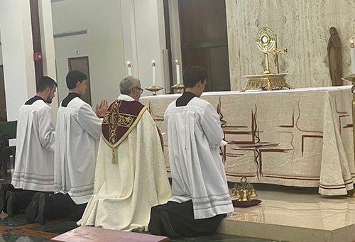 Deacon Jorge Reyes presides over the Holy Hour with exposition of the Blessed Sacrament July 20, 2024, at St. Raphael Chapel of St. John Vianney College Seminary in Miami. The Holy Hour was part of the local Eucharistic Congress organized by the archdiocesan Hispanic Apostolic Movements and coincided with the National Eucharistic Congress held in Indianapolis, Indiana, July 17-21, 2024.