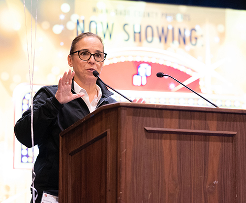 Maria Riestra-Quintero, president of the Florida Head Start Association and Miami-Dade Head Start and Early Head Start Program Director, speaks during an annual conference and awards luncheon for Head Start of Miami-Dade County Aug. 9 at the DoubleTree Hotel Miami Airport.