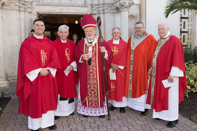 Miami Archbishop Thomas Wenski with local clergy after the the 32nd annual Red Mass, Reception and Dinner hosted by the St. Thomas More Society of South Florida, in Broward County.
