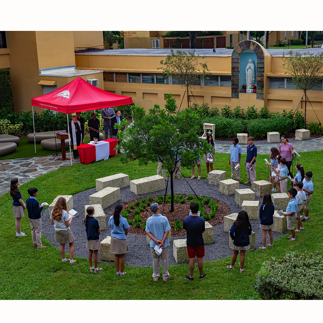 Students at St. Rose of Lima School in Miami Shores pray the rosary on the Feast of Our Lady of the Rosary as Archbishop Thomas Wenski prays with them in the school's newly renovated courtyard. Archbishop Thomas Wenski blesses the school's remodeled courtyard and cafeteria Oct. 7, 2024.