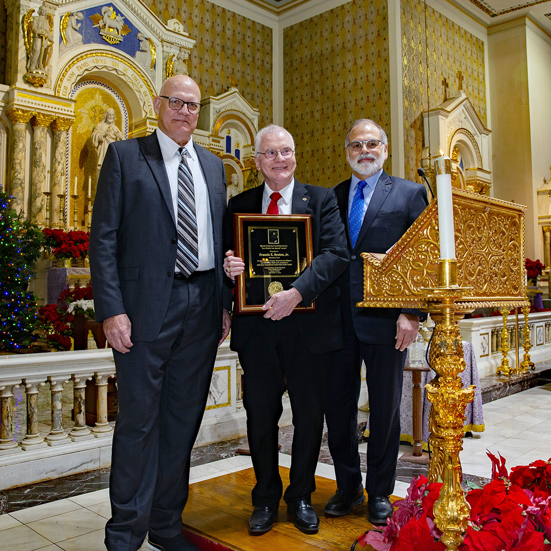 Left to Right, 2023 Lex Christi, Les Amoris award recipient Federal Magistrate Judge John O'Sullivan, Francis X. Sexton Jr., this year's award recipient, and Miami Catholic Lawyers Guild president Raoul Cantero pose for a photo.
Archbishop Thomas Wenski celebrated the annual Red Mass at Gesu Church of Miami on Dec. 11, 2024.