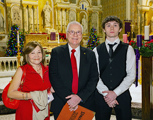 The 2024 Lex Christi, Lex Amoris award recipient Francis X. Sexton Jr. poses for a photo with his wife, Maria Teresa Zuniga, and grandson, Derek Sexton, 17.
Archbishop Thomas Wenski celebrated the annual Red Mass at Gesu Church of Miami on Dec. 11, 2024.