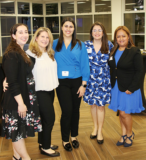 From left: Educators Lisa Donna, Carmen Vigilante-Szucko, Katrina Figueroa, Irene Marinelli and Ana Nunez pose during the celebration reception held Jan. 10, 2025 in anticipation of their upcoming graduation in May 2025 from the first cohort of a two-year master's degree program in educational leadership for Catholic education at St. Thomas University in Miami Gardens. Graduates will be qualified to apply for principal and other administrative positions in the archdiocese.