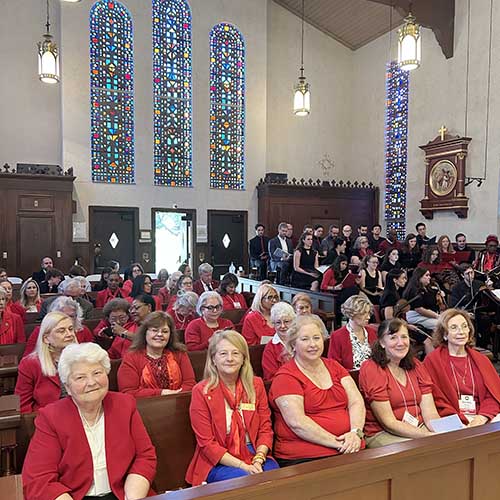 Fabiola Sanchez-De Armas, president of the Miami Archdiocesan Council of Catholic Women, second from left, sits with delegates from across Florida for the 50th Annual Red Mass of the Holy Spirit held on March 19, 2025 at the Co-Cathedral of St. Thomas More following the Catholic Days at the Capitol. The MACCW sponsored the bus ride for over 30 Miami delegates.