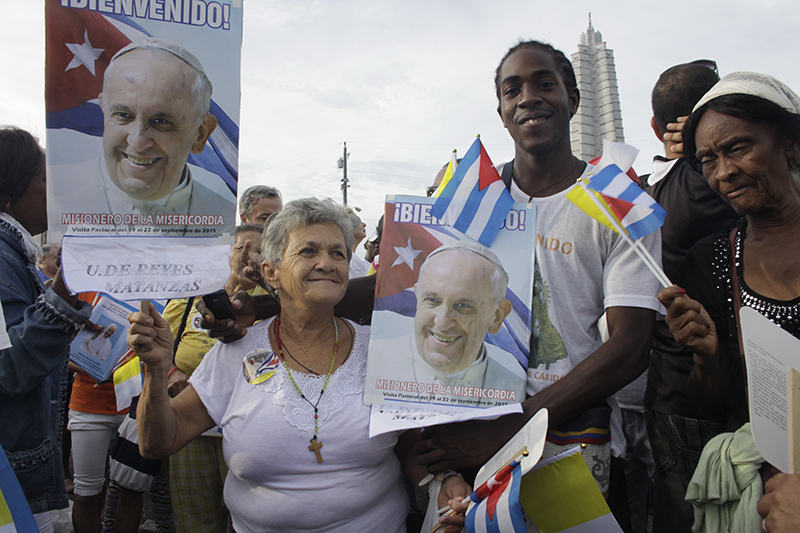 A catechist in the Church of Our Lady of Charity in Union de Reyes, Matanzas, Cuba, shows her support for Pope Francis before his first Mass in Havana on Sept. 20, 2015.
Nearly 200 pilgrims from the Archdiocese of Miami, led by Archbishop Thomas Wenski, took part in Pope Francis' first Mass in the Plaza of the Revolution.