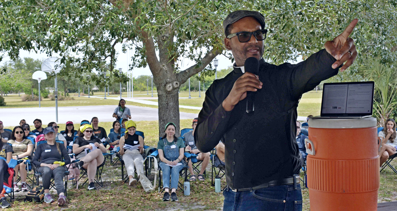 Father Louis Merosme offers a quick trot through St. Thomas Aquinas during "Faith, Reality and the Great Outdoors," a young adult retreat in Davie May 3-4, 2025.
