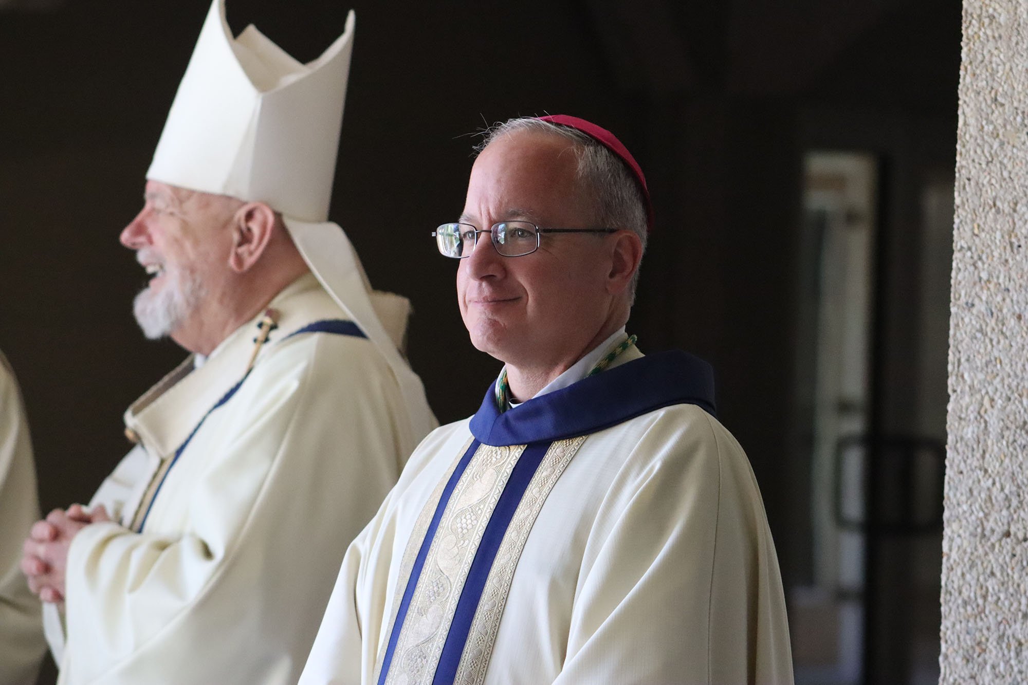 Prior to his episcopal ordination as auxiliary bishop of the U.S. Archdiocese for the Military Services May 9, 2025, Bishop-designate Gregg M. Caggianelli takes a moment before processing into St. Vincent Chapel on the campus of St. Vincent de Paul Regional Seminary in Boynton Beach, Fla., with clergy and bishops from across Florida and the nation. At left is Miami Archbishop Thomas G. Wenski.