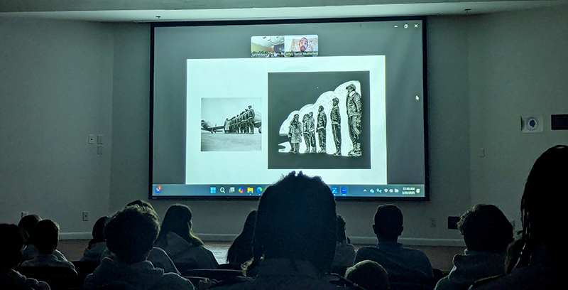 Nativity School students listen to Jeffery Boston Weatherford, co-author and illustrator of “You Can Fly: The Tuskegee Airmen,” on Zoom at Florida Memorial University in Miami Gardens during a field trip on Mar. 26, 2025. Boston Weatherford showed students how he created his artwork in the book and shared a piece of his performance poetry.