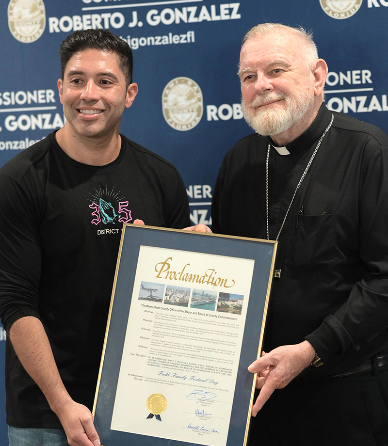 Miami-Dade County Commissioner Roberto Gonzalez, District 11, presented Archbishop Thomas Wenski with a proclamation declaring May 3, 2025, as Faith Family Festival Day. The event was held at the Miami-Dade Fair & Expo Center.