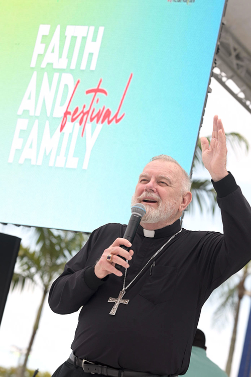 Archbishop Thomas Wenski speaks May 3 during the 1st Annual Faith Family Festival at the Miami-Dade Fair & Expo Center, where he received a proclamation declaring May 3, 2025, as Faith Family Festival Day.
