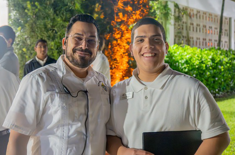 James Duque poses with a fellow seminarian from St. John Vianney College Seminary in Miami. Duque is in his Discipleship III year of formation at the seminary.