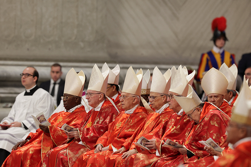 Cardinals attend a Mass in St. Peter's Basilica at the Vatican, May 7, 2025, the first day of the conclave to elect a new pope.