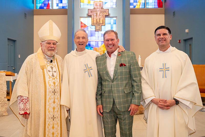 From left, Archbishop Thomas Wenski poses at the Mass of rededication of the Chapel of St. Anthony at St. Thomas University (STU) in Miami Gardens on April 29, 2025 with Father Patrick O'Neill, former STU president, STU President David Armstrong and Father Rafael Capó, STU vice president of mission and ministry.