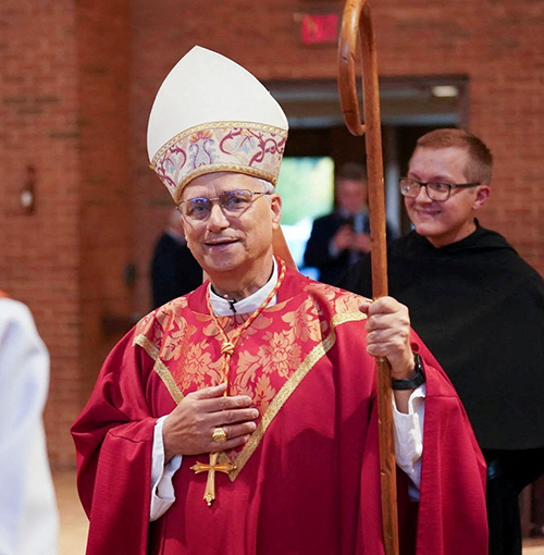 Then-Cardinal Robert F. Prevost, now Pope Leo XIV, smiles as he arrives to celebrate Mass at St. Jude Church in New Lenox, Ill., Aug. 7, 2024. Pope Leo was elected at the Vatican May 8, 2025, becoming the first American pope in history.