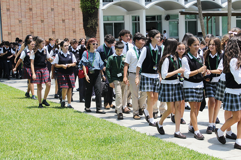 Sixth grade students from Catholic schools in the Archdiocese of Miami, accompanied by their teachers and chaperones, walk through the campus of St. John Vianney College Seminary in Miami May 15, 2025, during the Focus 11 Vocations Rally.