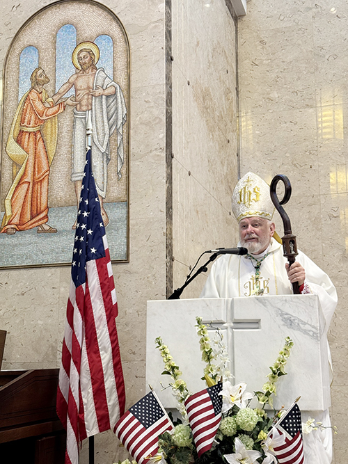 Archbishop Thomas Wenski preaches the homily while celebrating a Mass for Memorial Day May 26, 2025, in the chapel of Our Lady Queen of Heaven Cemetery in North Lauderdale.