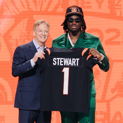 Msgr. Edward Pace High Class of 2022 alum Shemar Stewart poses with NFL Commissioner Roger Goodell holding his new Cincinnati Bengals jersey. Stewart was the 17th selection in the 2025 first round of the NFL draft, held April 24 at Lambeau Field in Greenbay, Wisconsin.