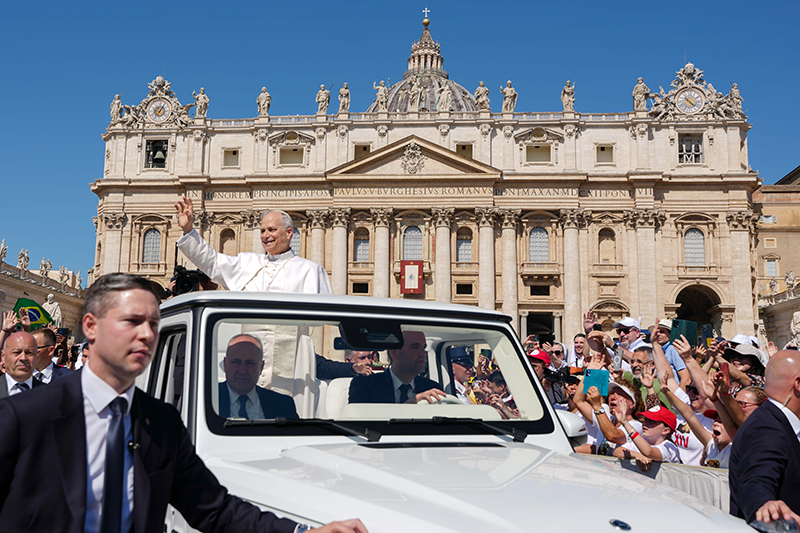 Pope Leo XIV greets people as he rides in the popemobile before celebrating Mass in St. Peter’s Square at the Vatican June 1, 2025, as part of the Jubilee of Families, Children, Grandparents and the Elderly.