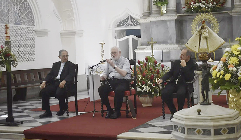 From left, Cardinal Juan de la Caridad of Havana, Archbishop Paul R. Gallagher and Archbishop Antoine Camilleri, apostolic nuncio, speak June 6, 2025, in St. Catherine Church in Havana. Archbishop Gallagher, Vatican secretary for relations with states, visited Havana to commemorate the 90th anniversary of the establishment of diplomatic relations between Cuba and the Holy See.