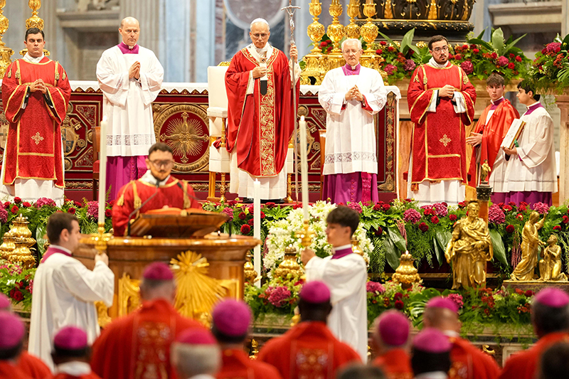Pope Leo XIV holds his crosier as the Gospel is read during Mass for the feast of Sts. Peter and Paul in St. Peter’s Basilica at the Vatican June 29, 2025.