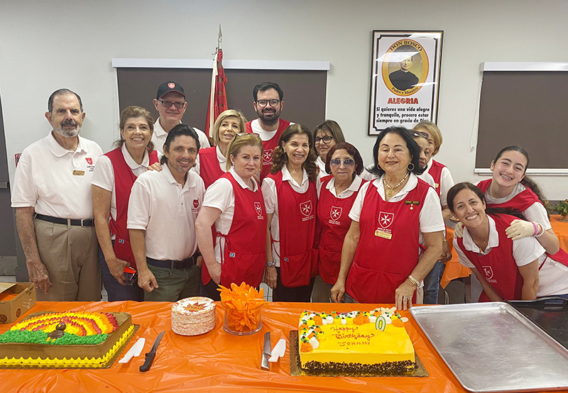 Members and Volunteers of the Cuban Association Order of Malta celebrating the holidays at the Casa de Malta by serving those in need Nov 9, 2024.
