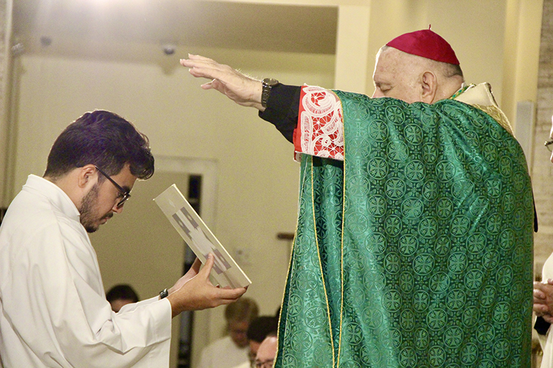 Archbishop Thomas Wenski blesses pilgrims during the Jubilee of Young People Mass July 17, 2025 at St. Mary Cathedral in Miami. The pilgrims traveled to Rome for the Jubilee of Young People from July 28 to August 3.