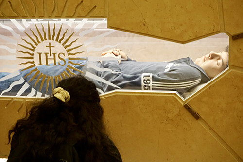 In May 2023, Monica Kan visited the incorrupt body of Blessed Carlo Acutis in Assisi, Italy. Blessed Acutis, a member of the millennial generation, will be the first of his generation to be canonized September 7, 2025.