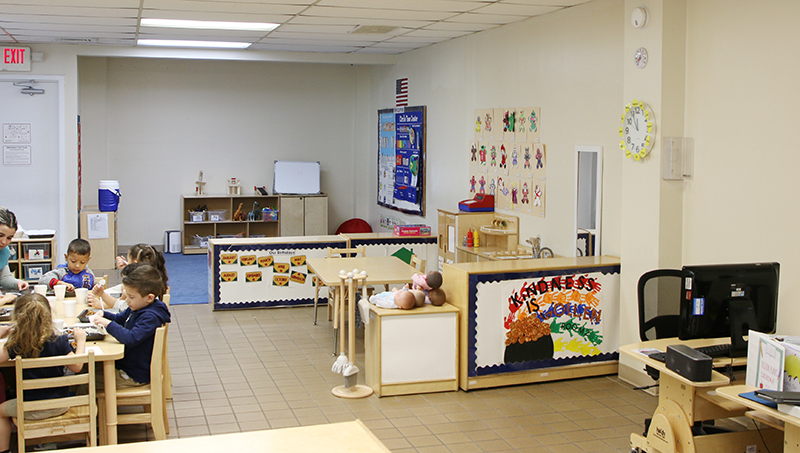 Catholic Charities Child Development Services staff members care for preschool children at Sagrada Familia Child Development Center in Little Havana on Jan. 30, 2025.