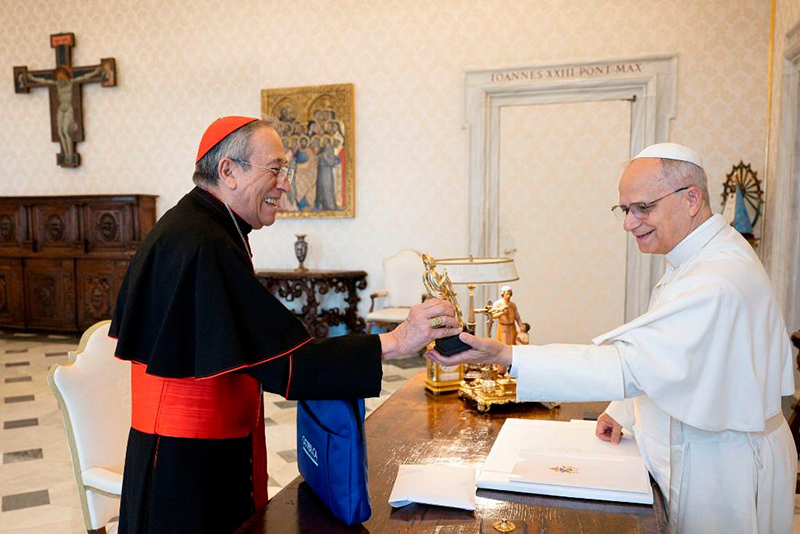 Cardinal Óscar Rodríguez Maradiaga presentes Pope Leo XIV with a replica of the Catholic Music Award, which was given to the winners of the first Catholic Music Awards on July 27, 2025, in Rome.