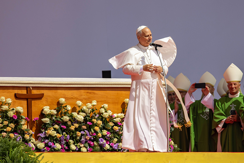 Pope Leo XIV gives a word of thanks as his mozzetta lifts in the breeze at the conclusion of the Jubilee of Youth in Rome’s Tor Vergata neighborhood Aug. 3, 2025.
