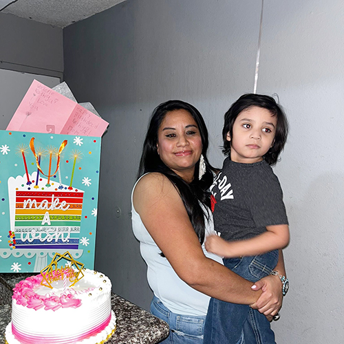 Katia Reyes holds her son Liam in Oct. 2024. Her son attended Catholic Charities’ Sagrada Familia Child Development Center where he received critical developmental and health services.
