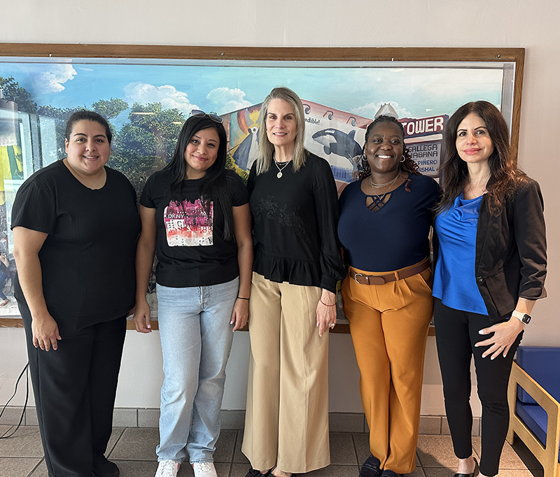 Catholic Charities Child Development Services staff members pose for a picture Aug. 11, 2025, at Sagrada Familia Child Development Center. From left: Yocelyn Tolosa, education coordinator of Sagrada Familia Child Development Center; parent Katia Reyes; Gladys Palacios, senior director of Child Development Services; Venante Exalant, regional director of Sagrada Familia and Notre Dame Child Development Centers; and Shalimar Ruggiero, licensed nutritionist.