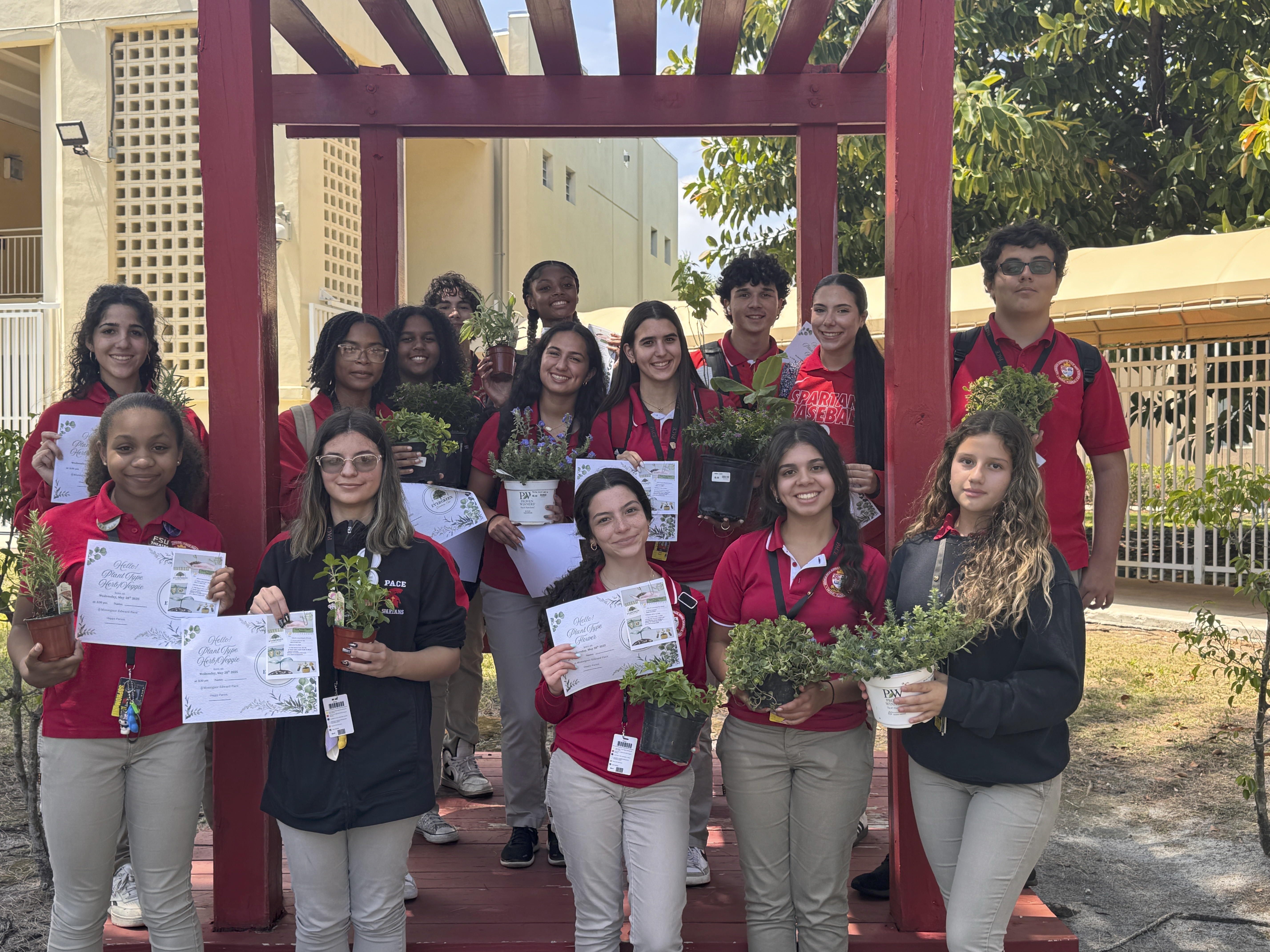 Members of the Monsignor Edward Pace High School Evergreen Club each took charge of a plant May 28,  2025, which were installed in the greenhouse during the fall 2025 semester.
