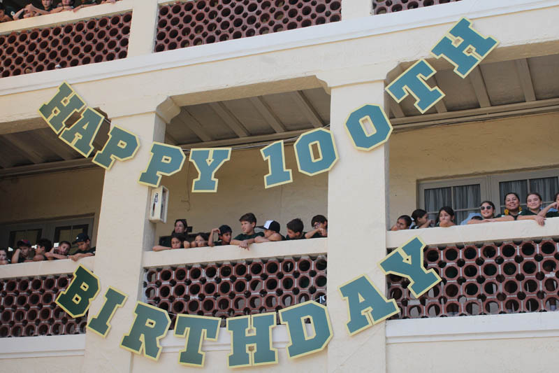 St. Theresa School students look out from the upper hallways of their school as they await to sing "Happy Birthday" during the school's centennial birthday bash celebrated Sept. 15, 2025.