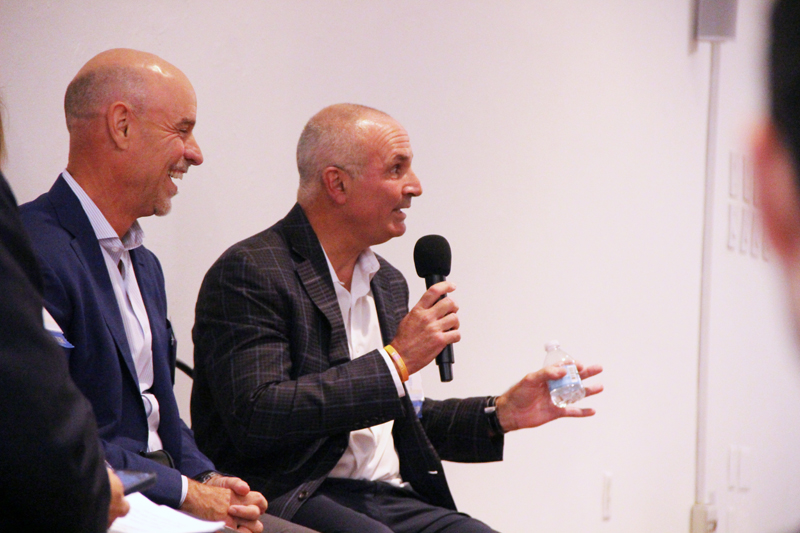 Jorge Rico (right), managing partner at MBF Healthcare Partners, speaks at Theology on Tap: Empowering Young Catholic Professionals, which took place at the University of Miami (UM) Catholic Student Center in Coral Gables September 26, 2025. He presented alongside Robert Sanchez (left), as well as Tony Argiz and Mercy San Miguel, all Catholic business leaders from South Florida.