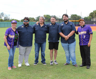 The newly renovated athletic field at St. Michael the Archangel School, Miami, was made possible by the work of 3A Builders, (in blue) Armando Senra, Jr., Armando Senra, Sr., Gilbert P. Senra, and Adrian Senra, who attended the inauguration and blessing of the space on Sept. 28, 2025. Accompanying in the photo is St. Michael the Archangel School Principal Lisette Reina-Naranjo and St. Michael the Archangel Parish Pastor Father Elvis Gonzalez.