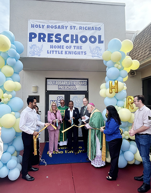 Archbishop Thomas Wenski blessed the new Holy Rosary St. Richard Preschool in Palmetto Bay, Oct. 5, 2025, after the ribbon-cutting ceremony. From left, Joshua Rugama, assistant principal at Our Lady of the Holy Rosary-St. Richard School; Karyn Cunningham, mayor of Palmetto Bay; Father Yosbany Alfonso, pastor of Our Lady of the Holy Rosary-St. Richard Church; Floredenis Brown, school principal; Jim Rigg, archdiocesan superintendent of Catholic schools; Archbishop Wenski; Cristina Pino, assistant principal; and Mark Merwitzer, vice mayor of Palmetto Bay.